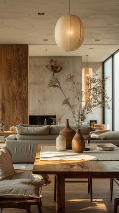 a living room filled with furniture and a wooden table