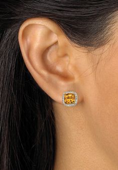 Capture the shimmer of fall with these gorgeous citrine stud earrings. Featuring genuine yellow citrine rounds in a pave-style design highlighted by a Yellow Diamond Earrings With Gemstone, Yellow Diamond Accented Fine Earrings, Yellow Diamond Accent Earrings In Fine Jewelry Style, Fine Jewelry Yellow Earrings With Diamond Accents, Yellow Earrings With Diamond Accents In Fine Jewelry Style, Luxury Citrine Earrings, Yellow Earrings With Diamond Accents, Yellow Round Jewelry With Pave Setting, Elegant Yellow Jewelry With Pave Setting