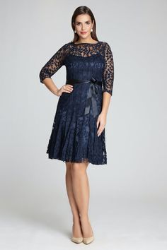 This head-turning dress is soon to be a party staple in your wardrobe. Beautiful black pin-tuck lace overlays a satin lining and a removable satin tie to show off your figure. Fit-n flare silhouette knee-length cocktail dress that falls and flounces to the knee with 3/4 fitted sleeves that hit at the elbow this dress is the perfect balance of sexy and sophisticated. This is a great buy if you are a size 2 or 22! Boatneck Lined interior Sheer Sleeves Straight cut until mid hip 3/4 sleeves Ribbon Summer Mother Of The Bride Dresses, Cocktail Length Dress, Head Turning Dress, Navy Cocktail Dress, Knee Length Cocktail Dress, Designer Bridesmaid Dresses, Teri Jon, Bridesmaid Dresses Online, Cocktail Dress Lace