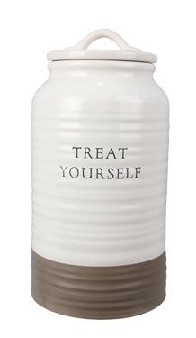 a white and brown canister with the words treat yourself on it