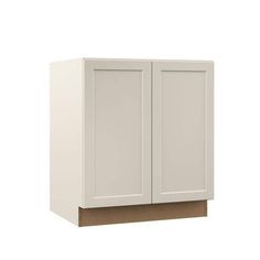 a white cabinet with two doors on the wall