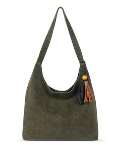 a green suede bag with tassels on the handles and shoulder strap, front view