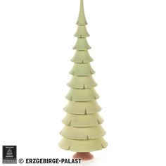 a small wooden christmas tree on a white background