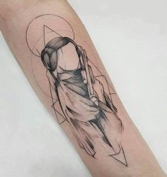 a woman's arm with an abstract tattoo design on the left side of it