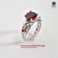 Solid 925 Sterling Silver Or Solid 10k/14k/18k White Gold With White Rhodium Finish & Round Cut Approx 2.25cttw Red CZ. Elegant Red Skull Ring For Gift, Elegant Red Skull Ring For Anniversary, Red Skull Ring For Anniversary, Gothic Red Gemstone Jewelry, Red Gothic Gemstone Jewelry, Gothic Round Ruby Jewelry, Red Gothic Jewelry For Anniversary, Gothic Ruby Jewelry, Engagement Ring Gothic