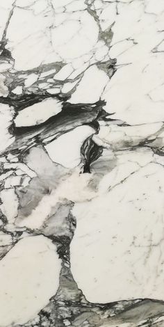 an abstract marble pattern with black and white colors