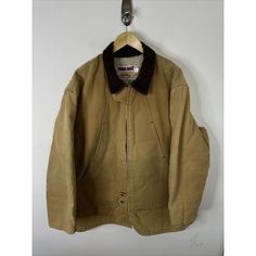 Vintage Tough Duck  Sherpa Lined Chore Jacket  Men Size 2XL  Made in Canada Canvas  Measures  Pit to pit 29 in  Shoulder to hem 36 in  Shoulder to shoulder 22.5 in  Shoulder to cuff 25.5 in  Condition Good, little bit of wear around cuff edge Winter Sport Coat With Corduroy Collar, Vintage Khaki Outerwear For Cold Weather, Rugged Long Sleeve Winter Outerwear, Rugged Winter Outerwear, Rugged Long Sleeve Outerwear With Padded Collar, Rugged Khaki Long Sleeve Outerwear, Vintage Outdoor Outerwear With Corduroy Collar, Vintage Outerwear With Corduroy Collar For Outdoor, Winter Outdoor Outerwear With Corduroy Collar