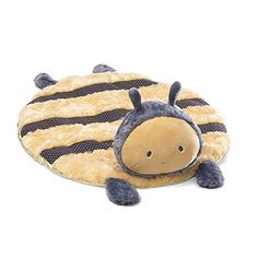 a stuffed animal that is laying down