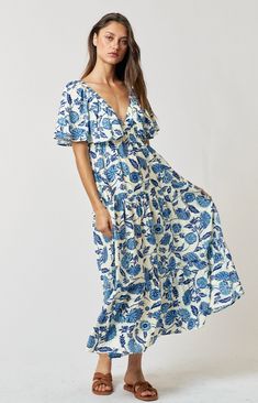 FLORAL PRINT DEEP-V NECK FLUTTER SLEEVE TIERED FLOWY MAXI DRESS - DEEP V NECKLINE - FLUTTER SLEEVE - TIERED MAXI DRESS - 83%RAYON 17%NYLON Hand Wash Cold. Blue Floral Maxi Dress, Maternity Midi Dress, Street Dress, Vacation Vibes, Ruffle Midi Dress, Flowy Maxi Dress, Floral Print Midi Dress, Floral Print Maxi Dress, Floral Print Maxi