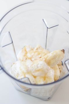 a blender filled with bananas and ice cream