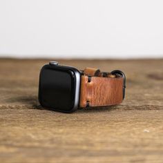 CONSTRUCTION• Handmade Apple watch band in Horween Leather: English Tan, Brown Nut, and Black Dublin• Simple stitching in black waxed polyester thread• Includes attached Apple watch adapters in black (Space Black) and polished silver (Stainless) • Brass PVD (matte black) buckle• Handmade in our North Carolina workshopSPECS • Available in 44mm/42mm and 40mm/38mm for Series1-6 Apple Watch• Sized to fit wrists 6.5" - 8.25"• For men or womenABOUT OUR PROCESSWe start with 5-5.5oz Horween leather and Apple Font, Simple Stitching, Handmade Watch Bands, Apple Watch Leather Strap, Apple Watch Sizes, Apple Watch 1, Black Leather Watch, Bracelet Apple Watch, Horween Leather