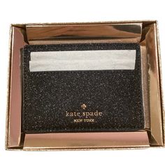 New With Tags In A Gorgeous Gold Sparkle Gift Box Absolutely Stunning Kate Spade Black Sparkle Card Holder Wallet This Is Definitely An Eye Catching Piece That Reflects The Light Beautifully. Approx. 3.9" W X 2.8" H Features 6 Credit Card Slots And An Open Middle Compartment Also Features Metal Pinmount With Spade Logo Materials: Glitter Fabric Trim: Saffiano Pvc Trim No Dustbag Style Number Ke448 Stock Photo To Help Show Color More Color Options Available - See My Other Listings Kate Spade Rectangular Wallet Perfect For Gift, Kate Spade Rectangular Wallets Perfect For Gifts, Kate Spade Rectangular Wallets Perfect For Gift, Kate Spade Rectangular Wallets As Gifts, Kate Spade Wallet With Interior Card Slots, Kate Spade Wallet Perfect For Gift, Kate Spade Wallet With Interior Card Slots As Gift, Kate Spade Wallet With Interior Card Slots For Gift, Spade Logo