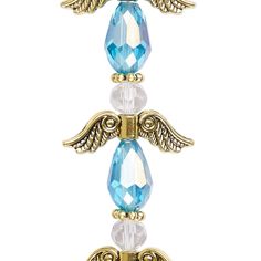 an angel brooch with blue crystals and gold wings on the front, set against a white background