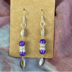 Beautiful purple sparkling beads made into dangle earrings. Lavender Adjustable Dangle Beaded Earrings, Lavender Beaded Dangle Earrings, Nickel-free Purple Beaded Earrings With Round Beads, Purple Dangling Beads Earrings For Party, Purple Beaded Earrings For Party, Purple Dangling Beads Party Earrings, Purple Adjustable Drop Crystal Earrings, Nickel-free Purple Beaded Earrings, Lavender Earrings With Dangling Beads For Gifts