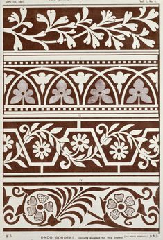 an old book with decorative designs on the pages, including flowers and leaves in brown