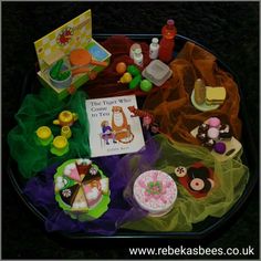 there are many different items on the table for children to play with in their own house