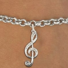 These Crystal Treble Clef Charm Bracelets Are Beautifully Handcrafted And Incredibly Detailed With Crystals That Will Make You See Stars. Comes With 7 1/2" Chain Bracelet And Lobster Clasp. Keep Just The Treble Clef Charm Alone Or Add To It To Give Yourself Some Personality! Brand New Handmade In England Rhodium Plated. Lead And Nickel Free 1 1/2 " H X 1/2" W Tags: Music Gift, Music Accessory, Music Themed, Music Jewelry, Silver, Clef, Treble Clef, Charm, Bracelet, Crystals Silver Band Bracelets For Concerts, Silver Bracelet For Concerts, Silver Bracelet Jewelry For Concert, Silver Band Jewelry For Concert, Silver Band Jewelry For Concerts, Adjustable Metal Music-themed Jewelry, Emo Accessories, Eye Drawing Tutorials, Musical Jewelry