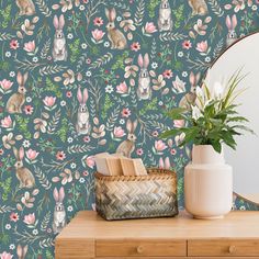 an image of a wallpaper with rabbits and flowers in the background on a dresser