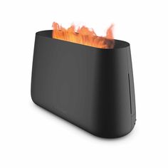 a black toaster with flames in it