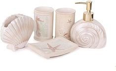 bathroom accessories including soap dispenser, toothbrush holder and seashell