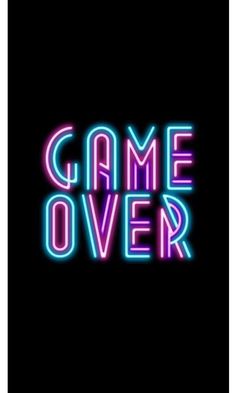 the words game over are lit up against a black background