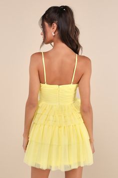 An attention-worthy look like the Lulus Special Poise Yellow Tulle Pleated Sleeveless Tiered Mini Dress will have everyone in awe all night long! Layers of sheer tulle mesh shape this iconic dress that features a pleated, sleeveless bodice, a flirty V-neckline, and adjustable spaghetti straps. A flattering, set-in waist sits atop a flouncy, tiered skirt that finishes at an alluring mini hem. Hidden back zipper/clasp. Fit: This garment fits true to size. Length: Mid-thigh. Size medium measures 26 Short Satin Dress, Cocktail Dress Yellow, School Dance Dresses, Tulle Mini Dress, Formal Dresses Short, Iconic Dresses, Lulu Dresses, Tier Skirt, Dress C