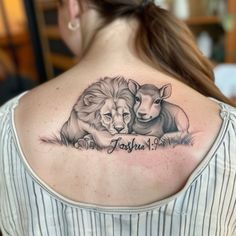 a woman with a lion and lamb tattoo on her shoulder