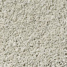 a close up view of a white carpet