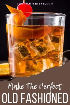 an old fashioned cocktail with oranges and ice cubes on the rim, in front of