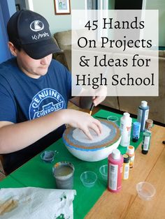 a person sitting at a table with a cake in front of him and the words, 45 hands on projects & ideas for high school