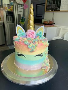 there is a cake that has a unicorn on it