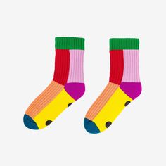 These thick toasty socks are unisex fleece-lined knit slipper socks are the best of both worlds! The easy fit of socks meets the plush comfort of house slippers. Our Kaleidoscope House Socks are knit with punchy fun colorblocking to keep you cozy (and bright) indoors. These soft knitted socks are fully lined with fluffy faux fleece for extra warmth. Non-slip patches on sole. Machine washable. Sizes S/M (Womens 6-9, Mens 5-7.5)L/XL (Womens 9.5-12.5, Mens 8-11) Details Body – 100% Soft AcrylicLini Knit Slipper Socks, Miscellaneous Gifts, House Socks, Garden Frame, Knit Machine, Blue Q, Knitted Socks, Soft Slippers, Knitted Slippers