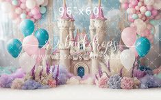 a castle with balloons and streamers in front of the backdrop for a princess birthday party