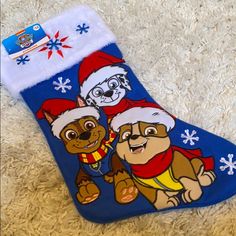 a pair of christmas socks with dogs on them