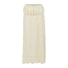 Introducing the Marion Skirt—a stunning blend of versatility and elegance. Crafted from reclaimed semi-sheer stretch crepe in a soft ivory hue and fully lined with a delicate ivory mesh, this floor-length skirt exudes a sense of effortless sophistication. The adjustable tie at the low hip allows for a customizable fit, making it a versatile addition to your wardrobe. Style it as a skirt or transform it into a strapless dress with the tie under the bust for a chic, carefree look. First showcased at Paris Fashion Week S/S '24, the Marion Skirt makes the perfect set when paired with the Antoinette Bra Top, capturing the essence of runway glamour in an everyday piece. 75% Lyocell 25% Elastane Lining: 70% Nylon 30% Elastane  Take to a trusted dry cleaner, or hand wash gently and lay flat to air Cream Maxi Skirt With Relaxed Fit And Lining, Cream Ruffled Long Skirt, Cream Relaxed Maxi Skirt With Lining, Cream Maxi Skirt, Relaxed Fit, Lined, Cream Long Ruffled Skirt, Cream Colored Relaxed Fit Lined Maxi Skirt, Elegant White Ruffled Maxi Skirt, Elegant Tiered Cream Maxi Skirt, Flowy Tiered Maxi Skirt In Cream