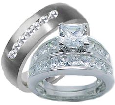 two wedding rings with white gold and diamonds on each band, set in 18k white gold