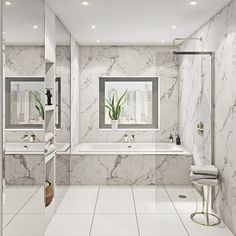 a bathroom with white marble walls and floors