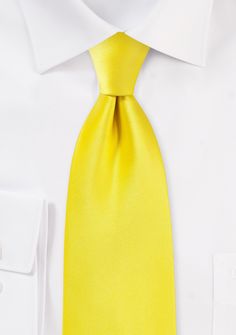 If you want to be noticed at each occasion you attend, you absolutely must have this canary yellow necktie in your wardrobe. This new accessory is a truly show-stopping piece, and it gives you a beautiful color-blocking addition to any attire you wear it with. Weddings and other events geared towards young people in the summer are great places to show off your tie collection. Don't be afraid to wear the coordinating pocket square if you want your outfit to be even more memorable for other people Classic Yellow Wedding Tie, Classic Yellow Ties For Work, Classic Yellow Tie For Formal Occasions, Formal Yellow Tie, Elegant Yellow Ties For Formal Occasions, Elegant Yellow Tie For Formal Occasions, Tie Collection, Canary Yellow, Don't Be Afraid