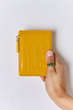 The texture PU leather mini wallet is a compact yet stylish accessory for all your essential cards and cash. Made from high-quality PU leather, it boasts a unique texture that adds a touch of sophistication to your everyday look. Despite its small size, this mini wallet is designed with practicality in mind, featuring multiple card slots and a zippered coin pocket for easy organization. The slim design allows it to easily fit into any pocket or bag, making it an ideal choice for those who prefer Easy Organization, Kids Outerwear, Mini Wallet, Car Charms, Slim Design, Leather Mini, Stylish Accessories, Everyday Look, Bag Making