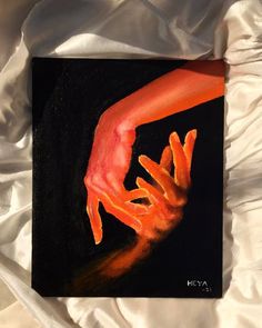 a painting of two hands reaching for each other on a black background with white sheets