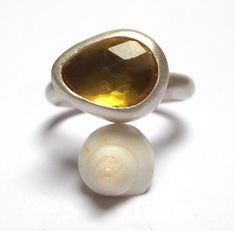 Citrine ring - Beautiful Citrine ring , The Citrine is inlaid in sterling silver . The Citrine gemstone size is - 15/11mm. The sterling silver ring band is 4mm. The ring size 10US/62U. Two sterling silver band rings 1.5mm. The Ring will be packed in a Beautiful gift box. Free Shipping! Your ring will be shipped to you via registered air mail with tracking number. Please contact me with any questions or requests. Unique Sterling Silver Rings With Bezel Setting, Unique Topaz Ring In Sterling Silver, Wedding Ring With Large Stone In Sterling Silver, Sterling Silver Ring With Large Stone For Wedding, Sterling Silver Rings With Large Stone, Modern Sterling Silver Rings With Large Stone, Unique Citrine Promise Ring, Oval Citrine Ring With Stone Setting, Silver Citrine Birthstone Ring