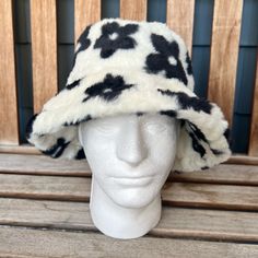 Party In Style This New Years And Keep Warm With This Soft Faux Fur Bucket Hat That Is White With Black Flowers! The Head Circumference Is About 22 Inches, And Has A Drawstring On The Inside. Never Worn. White Wide Brim Mini Hat For Winter, Adjustable Brimmed Faux Fur Hat, White Bucket Hat For Fall, Adjustable Faux Fur Brimmed Hat, Trendy White Winter Bucket Hat, Faux Fur Lined Brimmed Bucket Hat, White One Size Bucket Hat, White One Size Bucket Hat For Spring, White One-size Bucket Hat For Spring