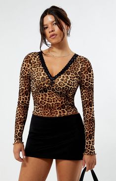 Make a wild statement with the Leopard Mesh Long Sleeve Top from LA Hearts. Featuring a semi-sheer mesh fabric, lace trimming around the v-neckline, long sleeves with lettuce-edge trimming, a cute bow front detail, and a trendy cropped fit, this top is perfect for an effortlessly fierce look.Leopard print topMesh fabricV-necklineLace trimBow front detailLong sleevesLettuce-edge trimmingCropped lengthFeaturedShell: 100% nylon; Lining: 100% polyesterHand washModel is wearing a size smallModel measurements: 5’7” height, 34” bust, 25” waist, 35.5” hip LA Hearts Womens Leopard Mesh Long Sleeve Top - Leopard Animal Print size XS Sheer Stretch V-neck Mesh Top, Fall V-neck Top With Sheer Sleeves, Fitted V-neck Mesh Top For Fall, Fall Season V-neck Mesh Top, Fall Sheer Sleeves V-neck Tops, Fitted Mesh V-neck Top, Stretch V-neck Top With Sheer Sleeves, Fitted V-neck Sheer Mesh Top, Mesh Long Sleeve Top