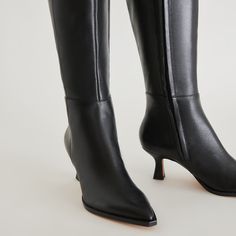 The epitome of wardrobe staple. There’s something undeniably timeless about AUGGIE’s sleek silhouette. Sustainably crafted in classic leather or rich suede, this knee-high heeled boot pairs well with warmer layers and sweater dresses. Leather Upper Recycled Synthetic Outsole Recycled Textile Lining Water-based Leather Alternative Sock Measurements are based on Size 6 boot. For each half size larger, shaft height will increase by 2mm and leg circumference by 5mm. 15.4" Shaft Height 2.4" Heel Heig Classic Tall Heeled Boots For Fall, Classic Mid-calf Boots With Sculpted Heel For Fall, Classic Knee-high Boots With Sculpted Heel For Fall, Classic Mid-calf Boots With Reinforced Heel For Fall, Wide Calf Calf Leather Knee-high Boots For Fall, Classic Knee-high Heeled Boots For Fall, Sleek Leather-lined Knee-high Boots For Fall, Classic Fall Knee-high Boots With Sculpted Heel, Fall Wide Calf Knee-high Boots In Calf Leather