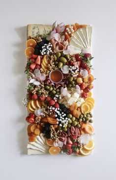 an art piece made out of fruits and vegetables