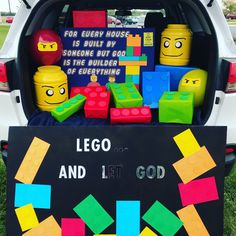 the back end of a car with legos and blocks on it's trunk