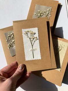 handmade cards with pressed flowers on them