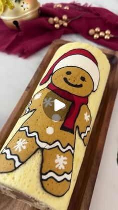 a wooden box with a gingerbread decorated on it