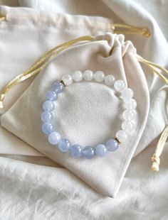 💫 Discover the metaphysical properties of White Jade and Aquamarine! 💫 💎 MATERIAL DETAILS ○ 8mm Aquamarine → courage, happiness, hope, and everlasting youth ○ 8mm White Jade → abundance, prosperity, detox, calmness, and love ○ 6mm spacers → 18k gold plated ○ High quality, resistant, and flexible elastic cord (double-corded) 💯 QUALITY & CRAFTSMANSHIP ○ Materials are handpicked, inspected, and handled with the utmost quality and care ○ Double-corded with high quality elastic cord - this means Moonstone Beads Jewelry Gift, Moonstone Jewelry With 8mm Beads As A Gift, Meditation Bracelets With Round Gemstones, Gemstone Stretch Bracelet For Meditation, Gift Moonstone Jewelry With 8mm Beads, Moonstone Jewelry With 8mm Beads For Gifts, White Jade Crystal Bracelet With Natural Stones, Blue Moonstone Bracelets For Healing, White Jade Crystal Bracelet For Healing