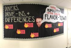 a bulletin board with flames and signs on it that say drivers drive ins, humility all the way to flavor town